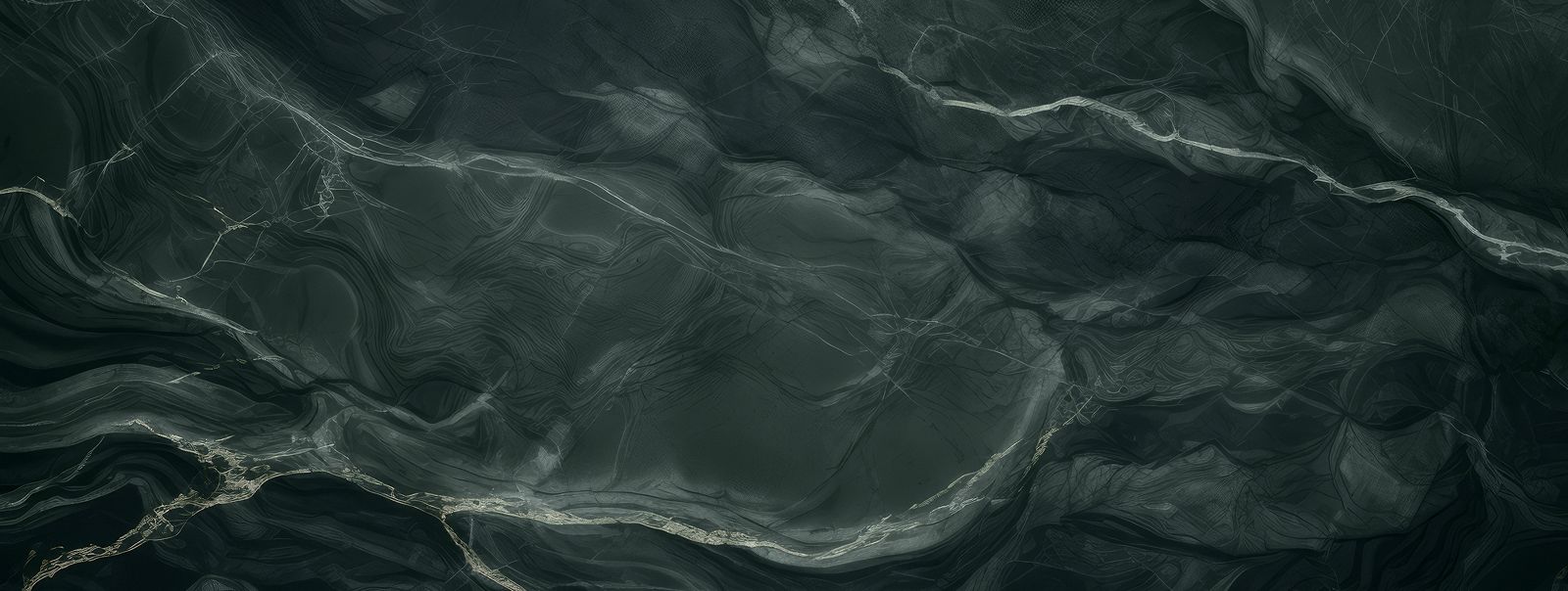 Abstract dark marble texture with subtle veining.