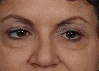 Close-up of woman's eyes and forehead.